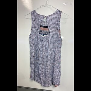 Tank top. Brand is “Gypsies & Moondust”